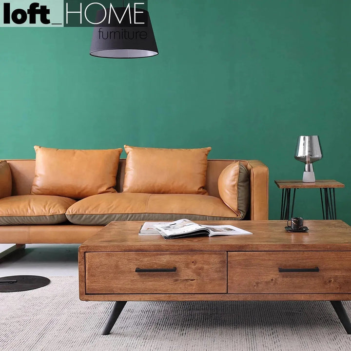 Vintage genuine leather 3 seater sofa canvas nut in close up details.