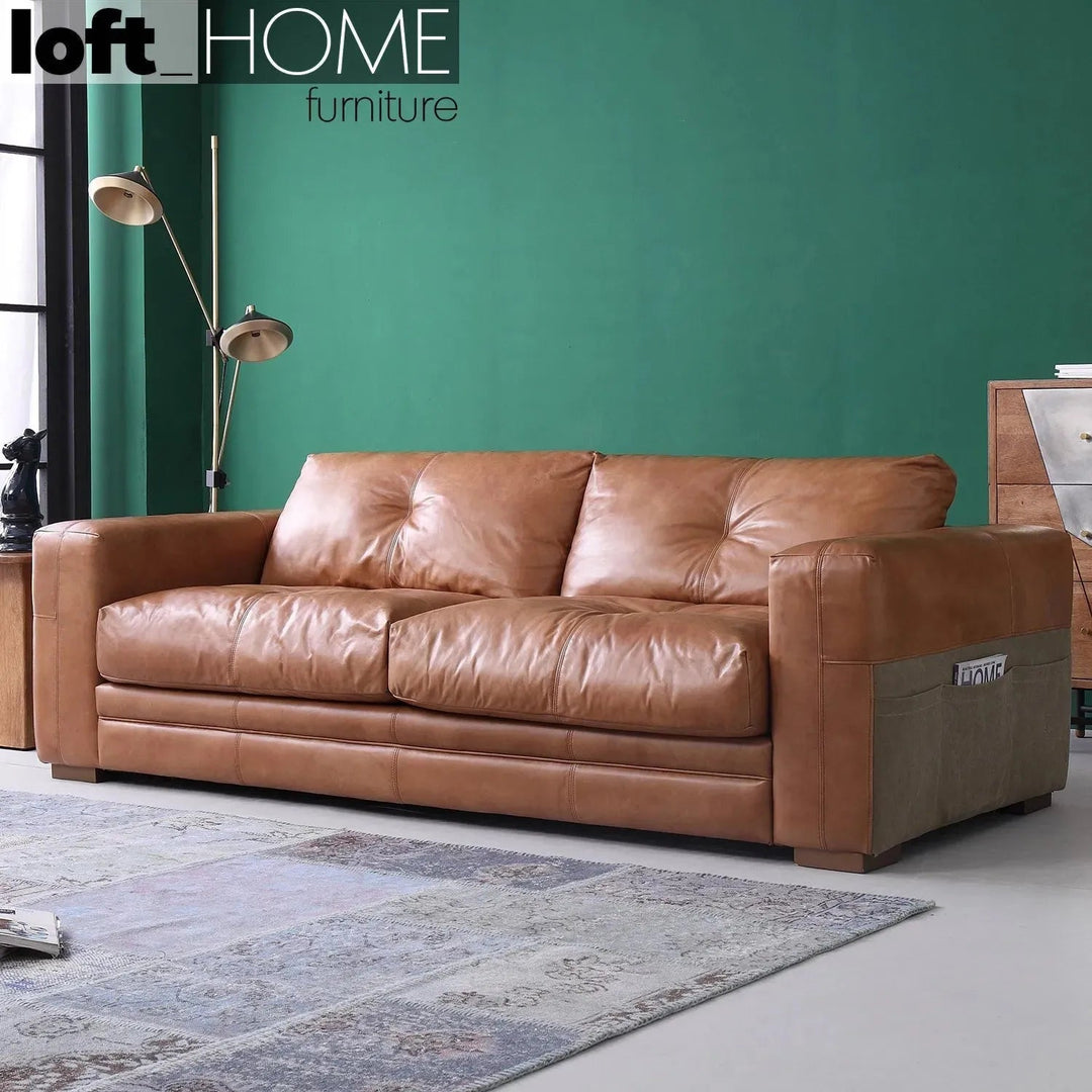 Vintage genuine leather 3 seater sofa canvas ter with context.