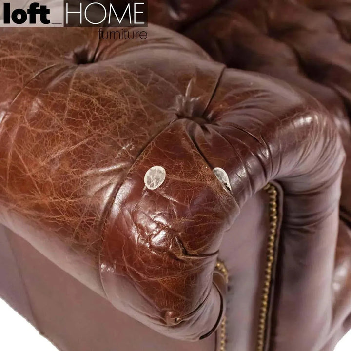 Vintage genuine leather 3 seater sofa chesterfield button layered structure.