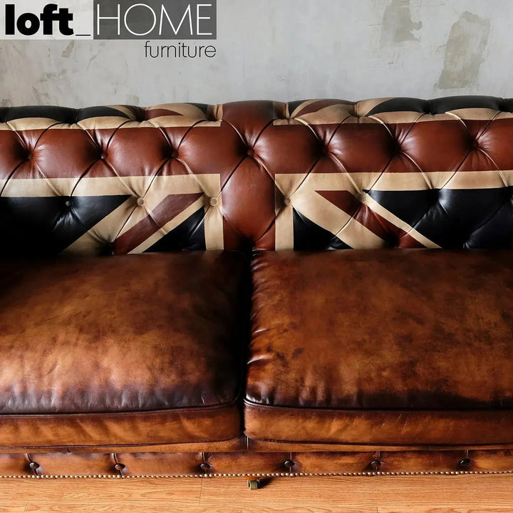 Vintage genuine leather 3 seater sofa chesterfield union jack in panoramic view.
