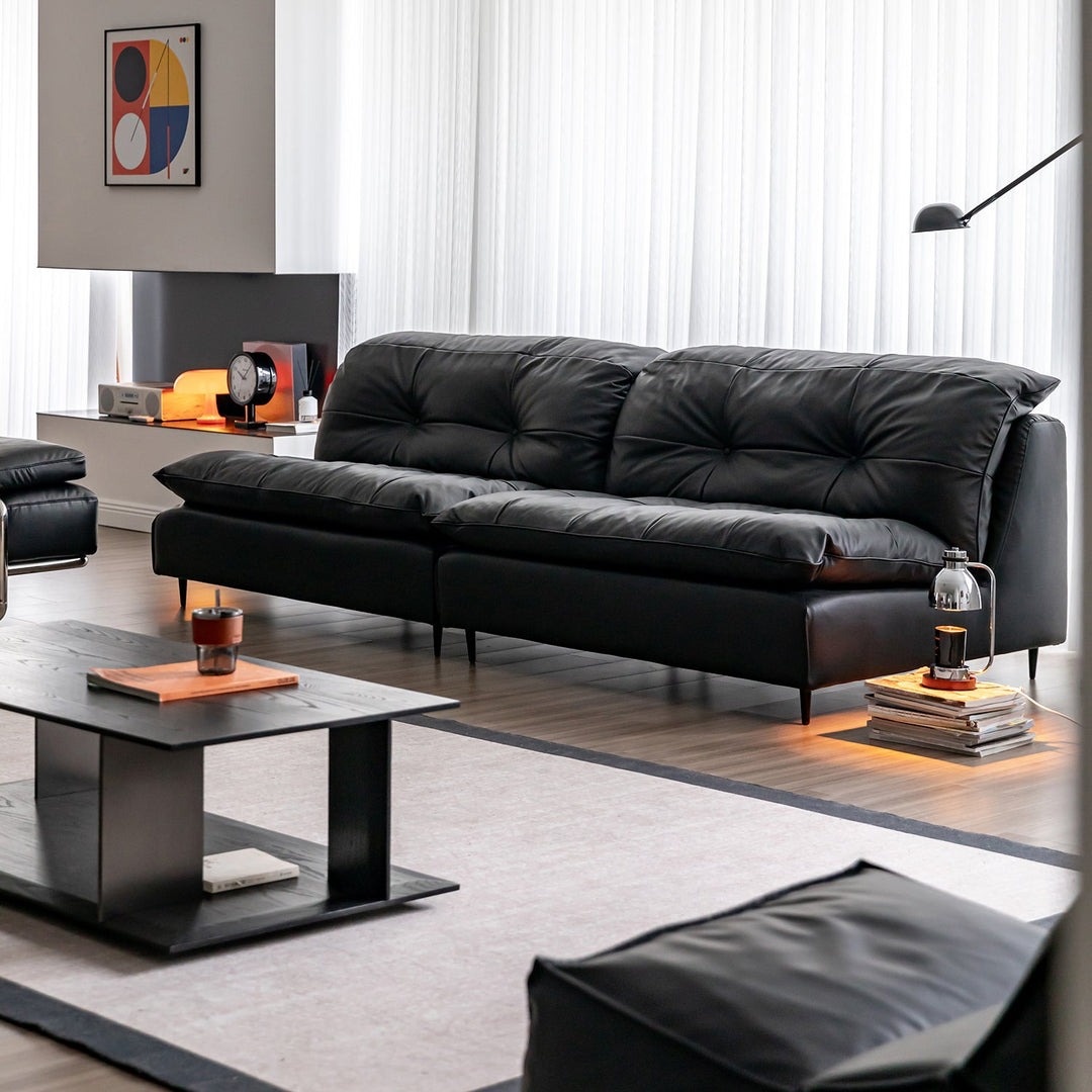 Vintage genuine leather 3 seater sofa riga in close up details.