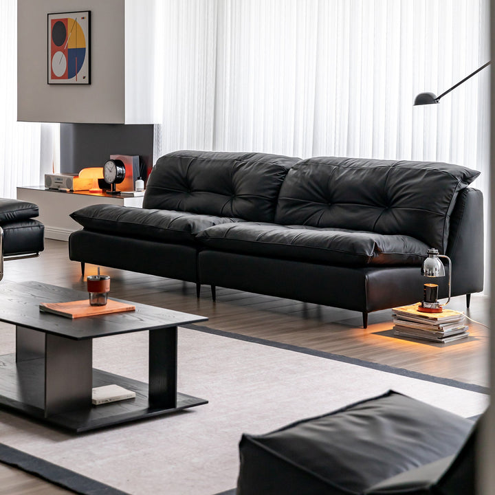 Vintage genuine leather 3 seater sofa riga in close up details.