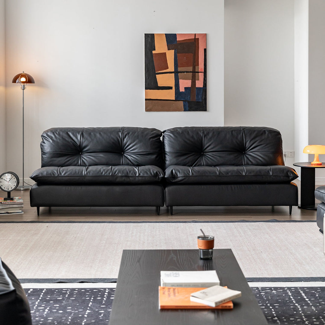 Vintage genuine leather 3 seater sofa riga in still life.