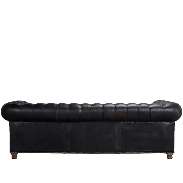 Vintage genuine leather 4 seater sofa chesterfield button in panoramic view.