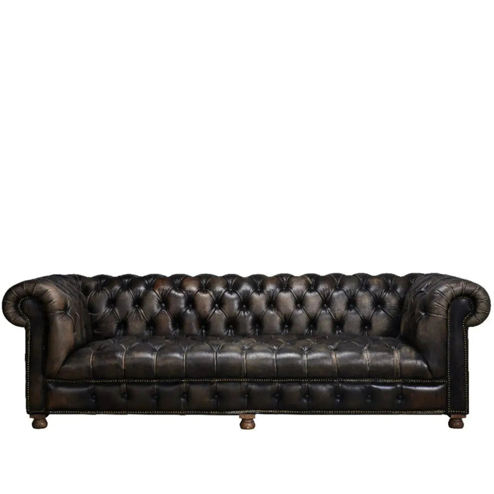 Vintage genuine leather 4 seater sofa chesterfield button in white background.