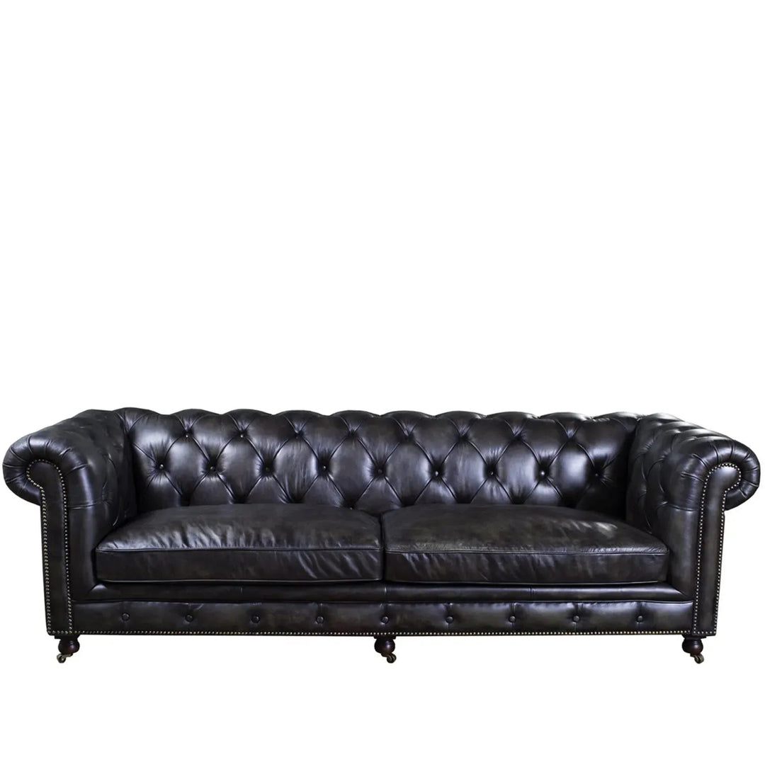 Vintage genuine leather 4 seater sofa chesterfield classic in white background.
