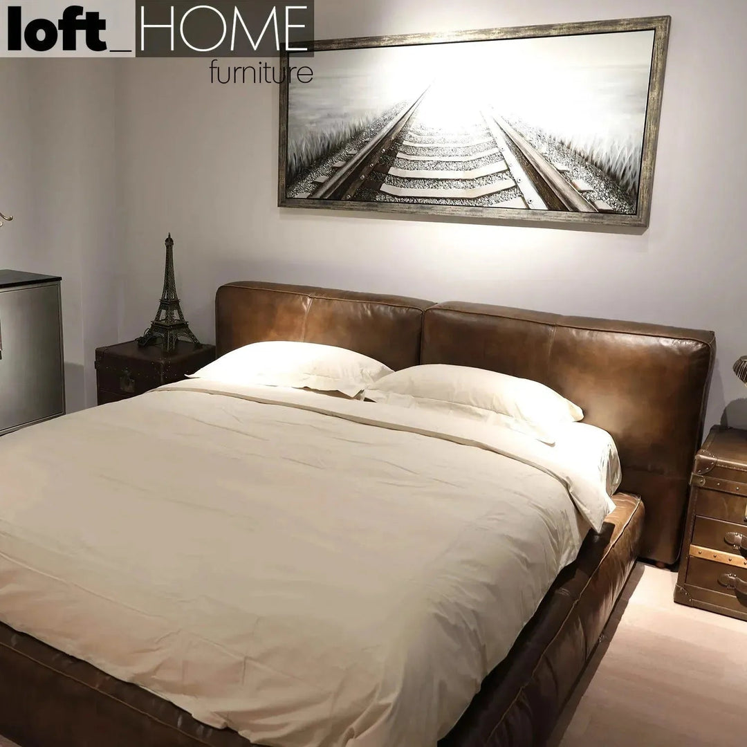 Vintage genuine leather bed frame antique master in close up details.