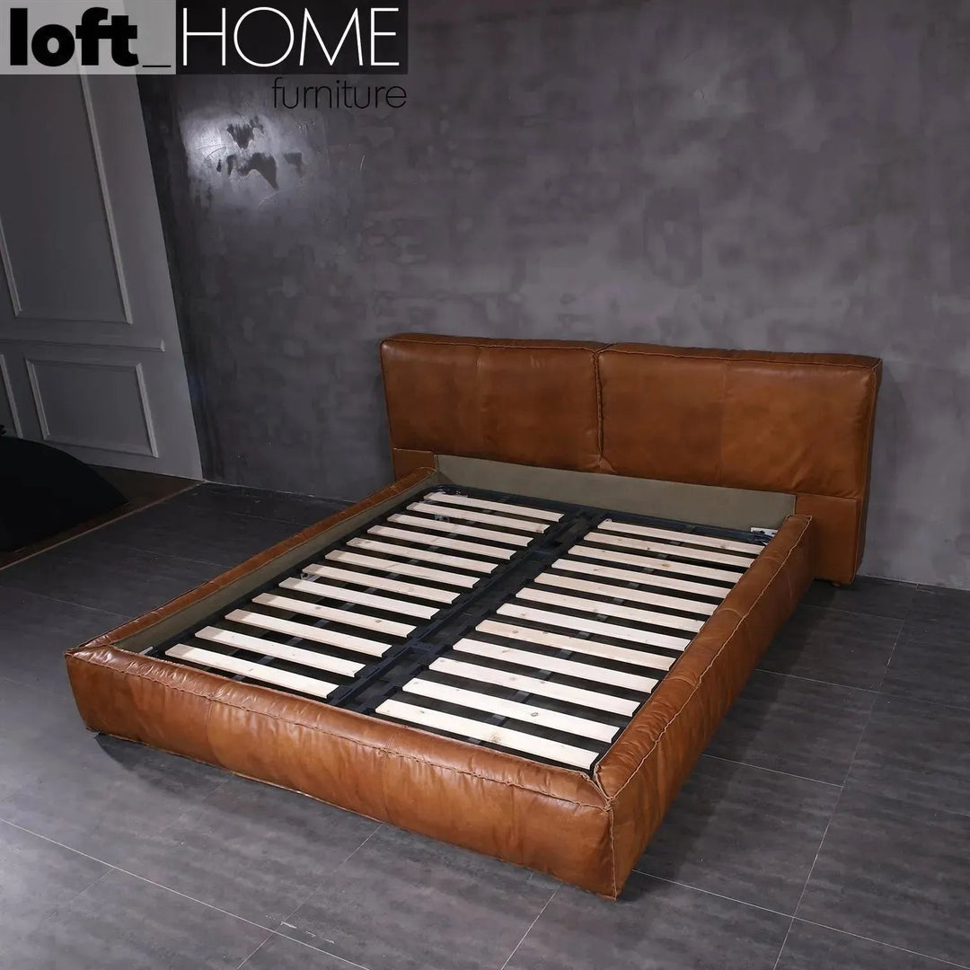 Vintage genuine leather bed frame antique master in panoramic view.