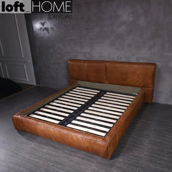 Vintage genuine leather bed frame antique master in panoramic view.