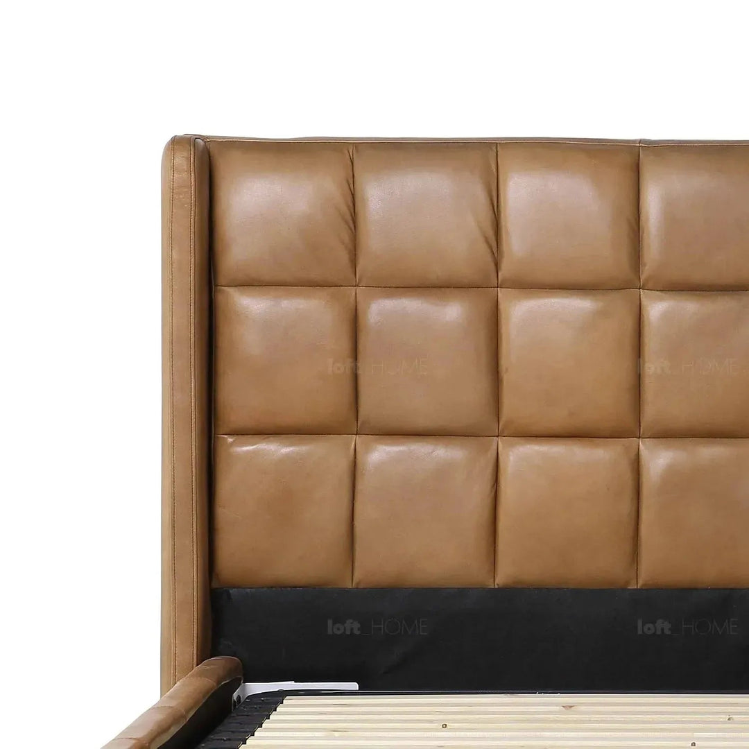 Vintage genuine leather bed frame tuxedo in still life.