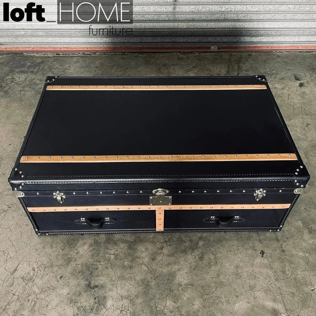 Vintage genuine leather coffee table ox trunk in close up details.