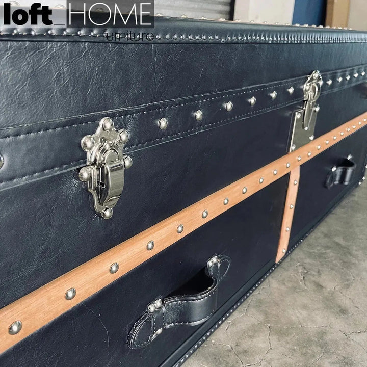 Vintage genuine leather coffee table ox trunk in panoramic view.
