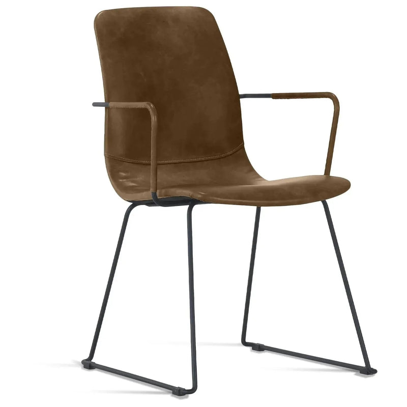 Bauhaus genuine leather dining chair oakley i in white background.