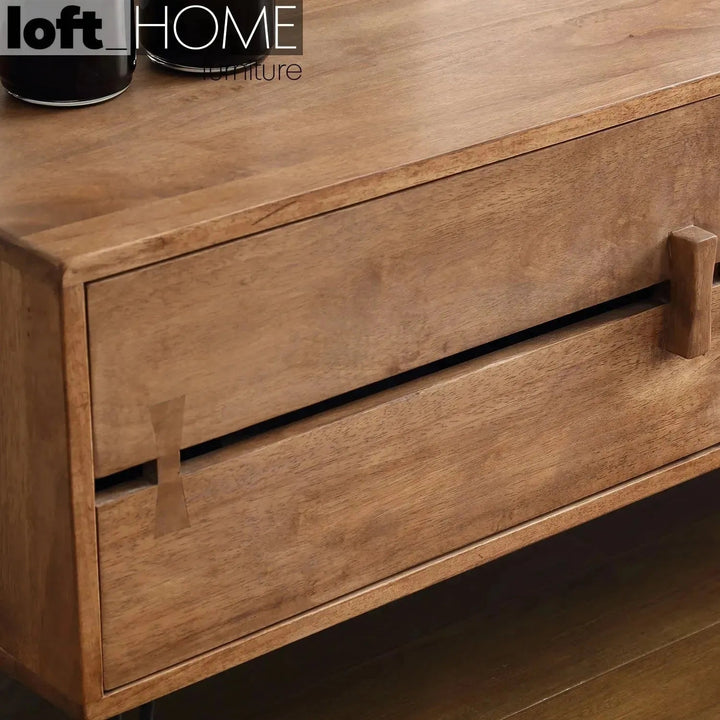 Industrial rubber wood tv console dovetail in close up details.