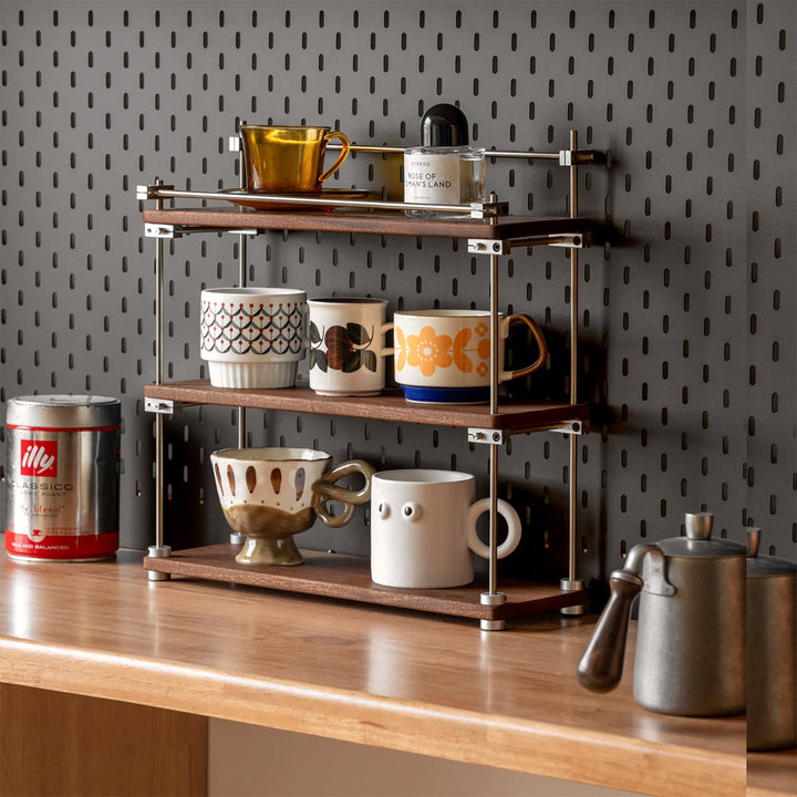 Bauhaus sapele wood stainless steel shelf packer primary product view.