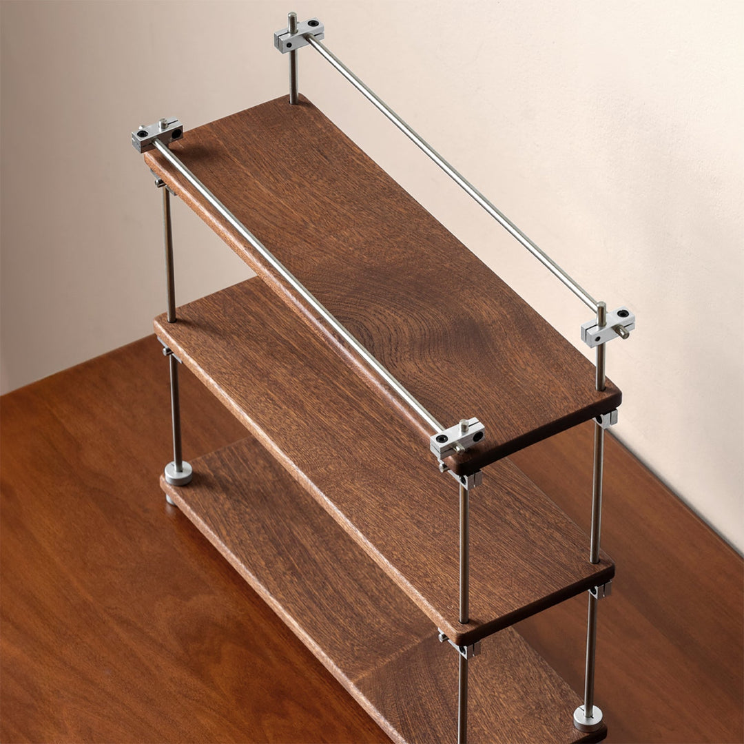 Bauhaus sapele wood stainless steel shelf packer in real life style.