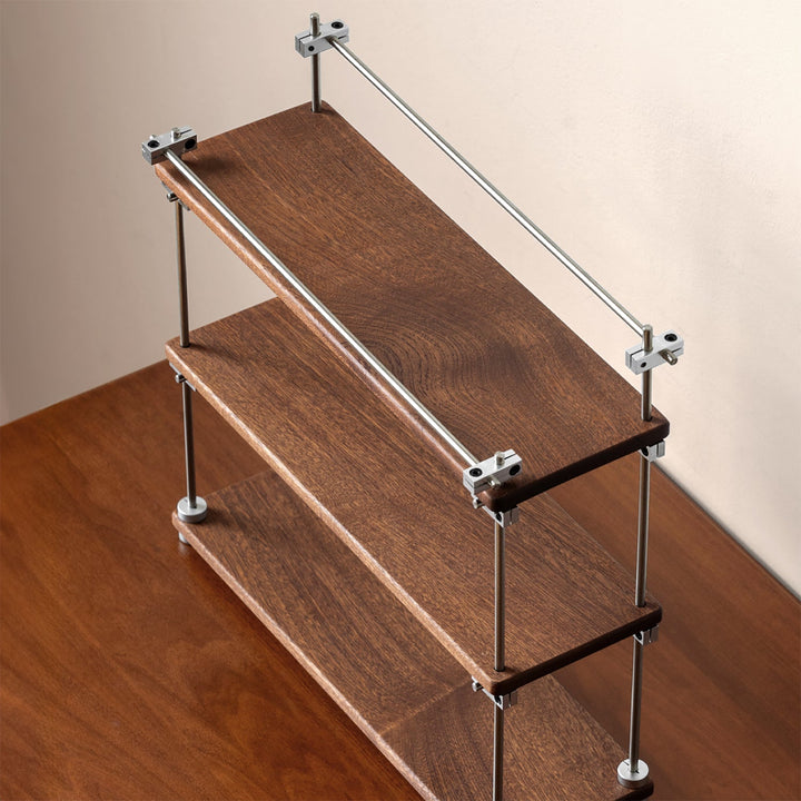 Bauhaus sapele wood stainless steel shelf packer in real life style.