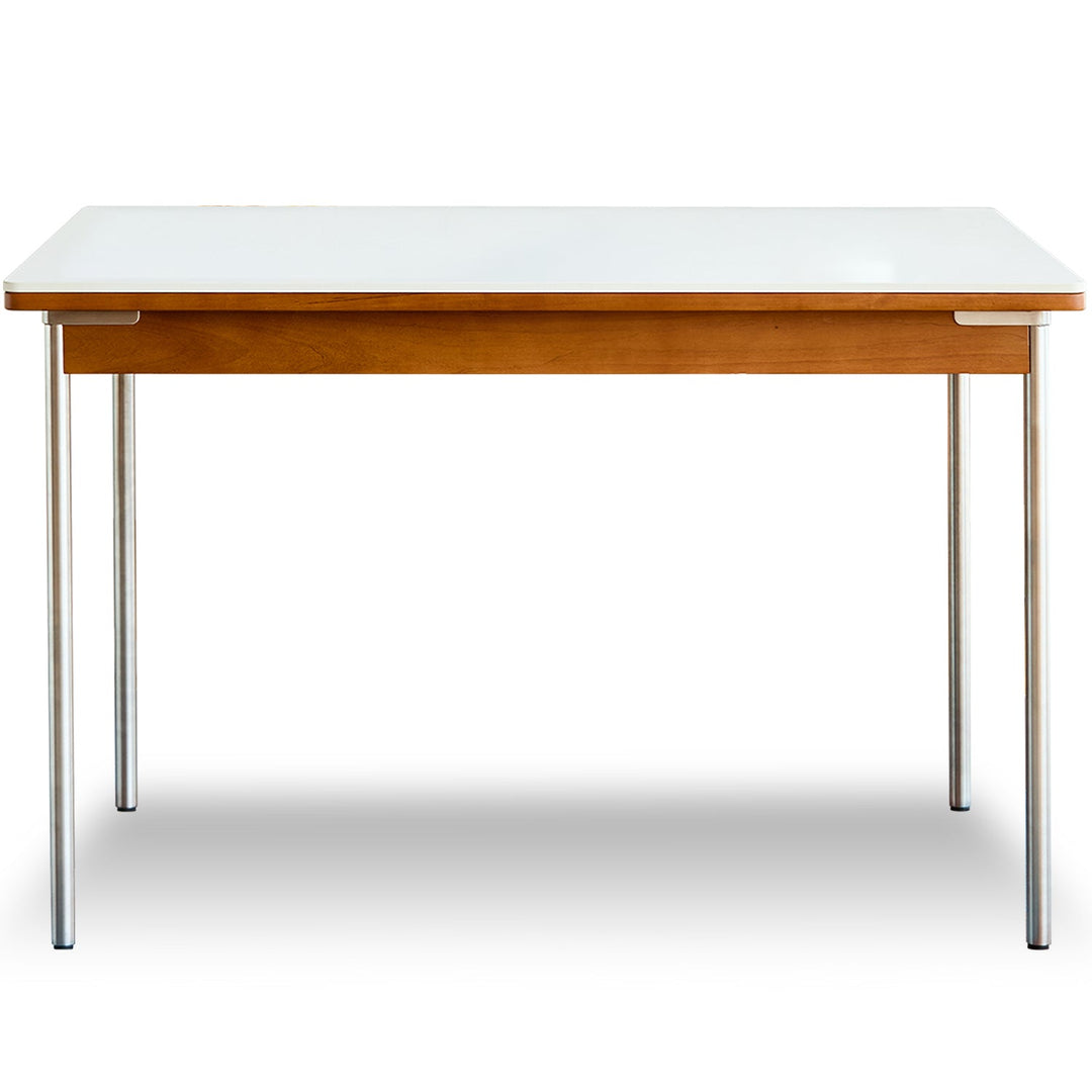 Bauhaus sintered stone boxwood dining table pinecone in white background.