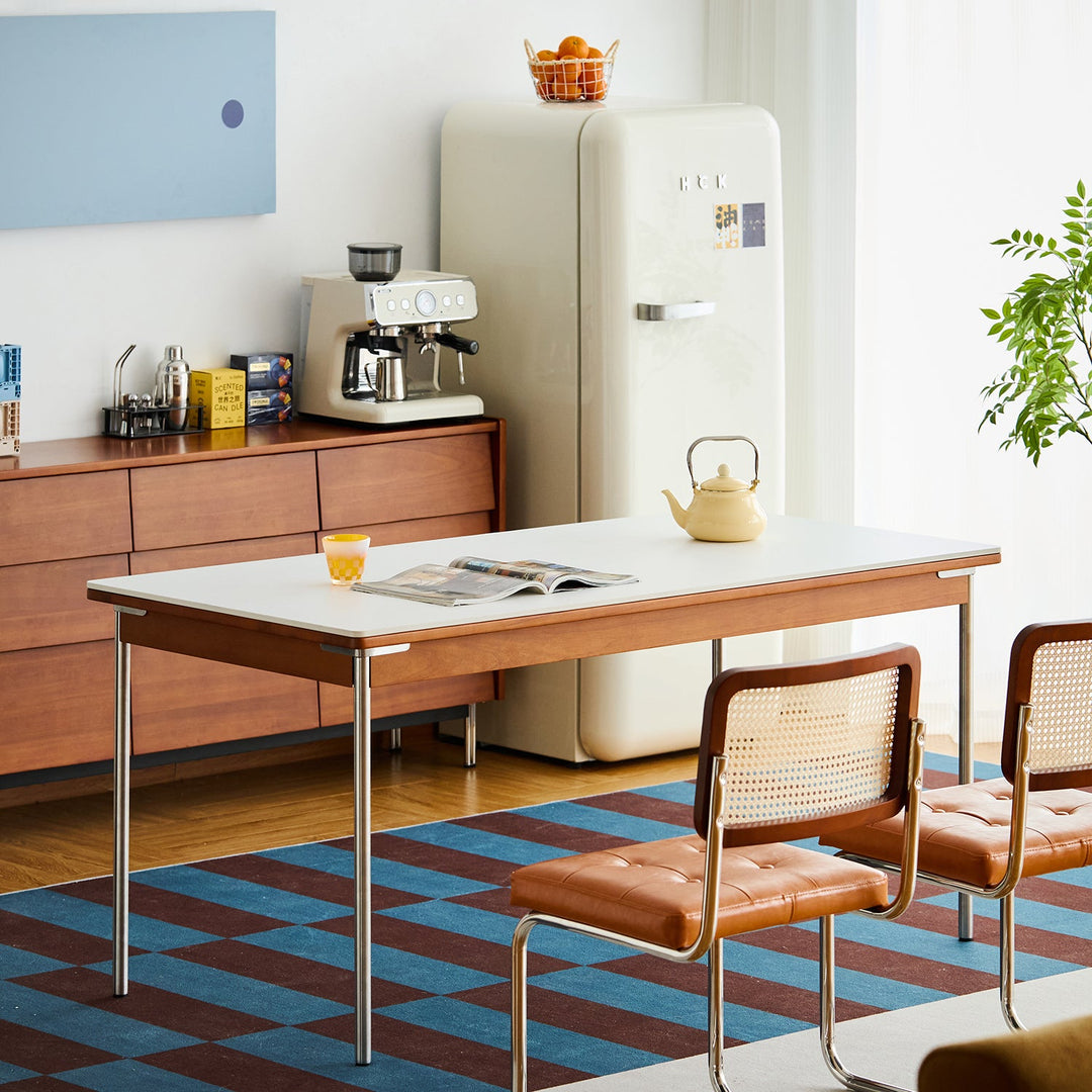 Bauhaus sintered stone boxwood dining table pinecone in real life style.