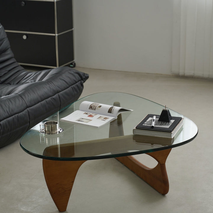 Vintage tempered glass coffee table noguchi material variants.