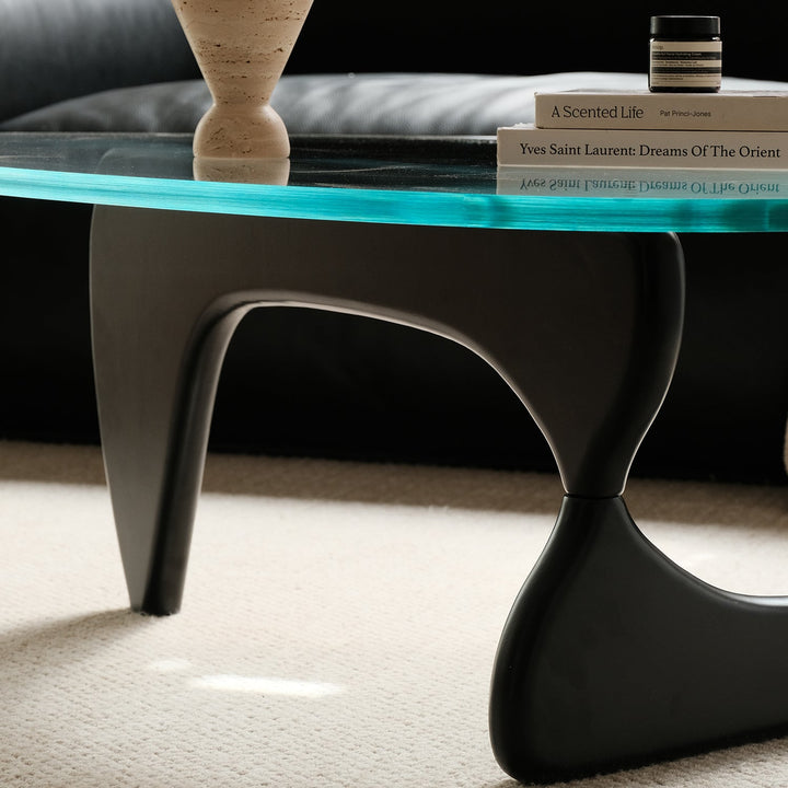 Bauhaus tempered glass coffee table noguchi in close up details.