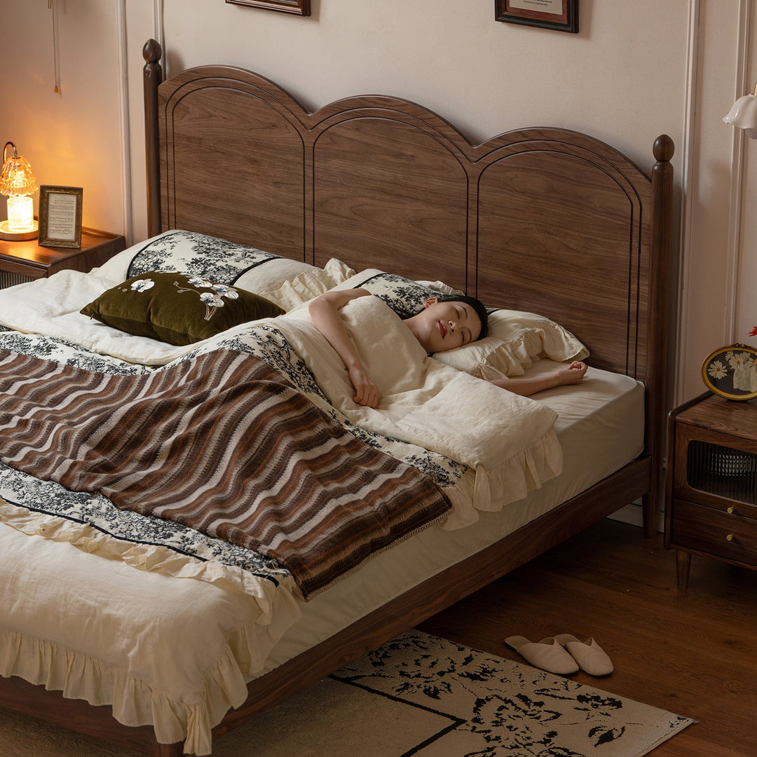 Vintage walnut wood bed midsummer with context.