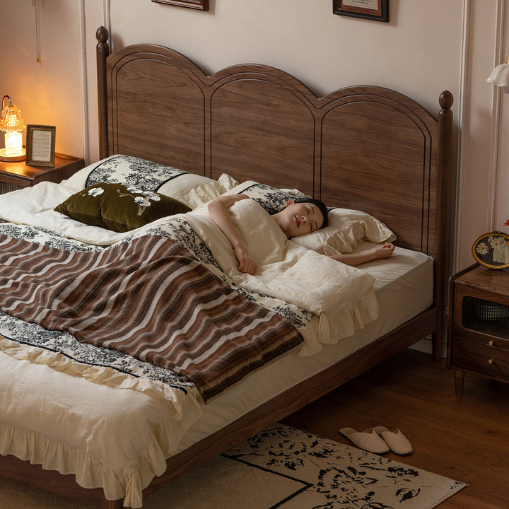 Vintage walnut wood bed midsummer with context.