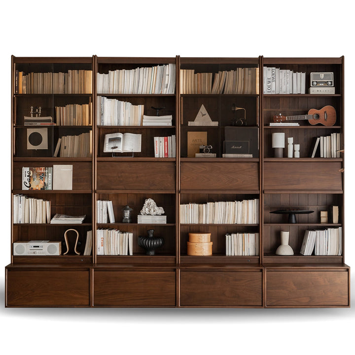 Vintage walnut wood bookshelf vista in white background.
