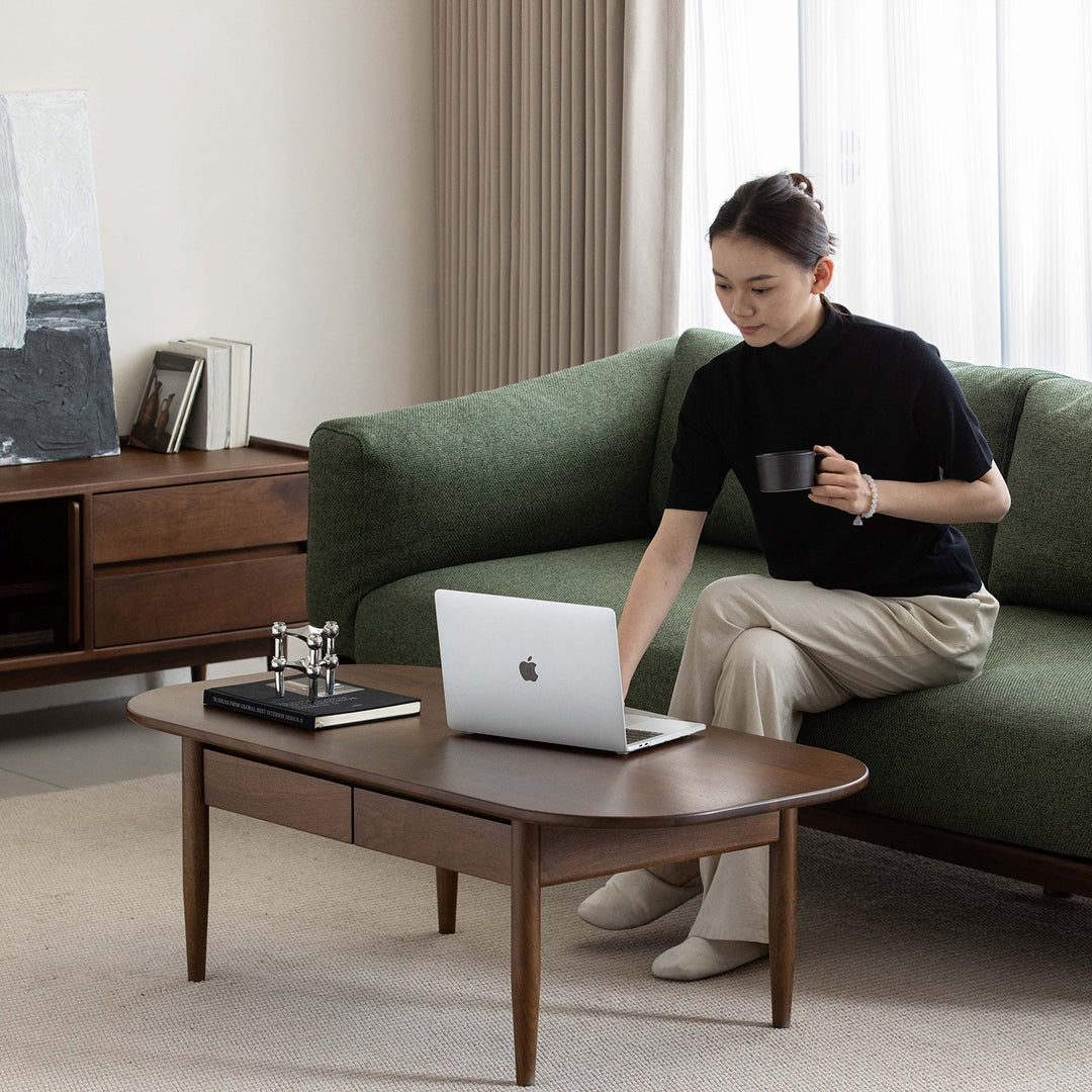 Vintage walnut wood coffee table vista in details.