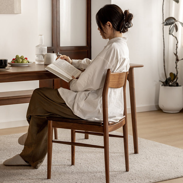 Vintage walnut wood dining chair chrono primary product view.