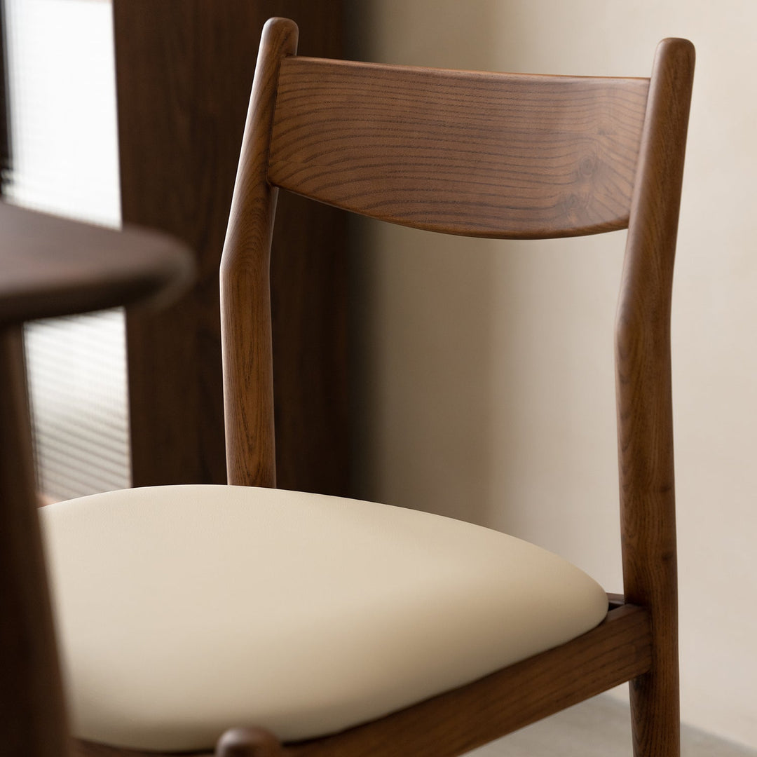 Vintage walnut wood dining chair purea in details.
