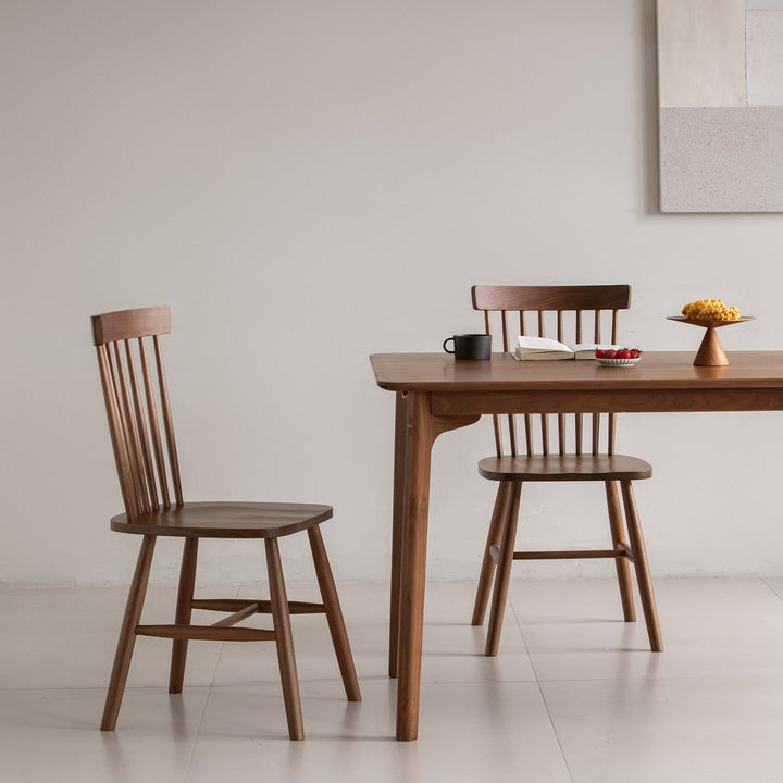 Vintage walnut wood dining chair windsor with context.