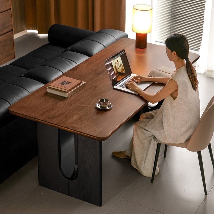 Vintage walnut wood dining table savor in details.