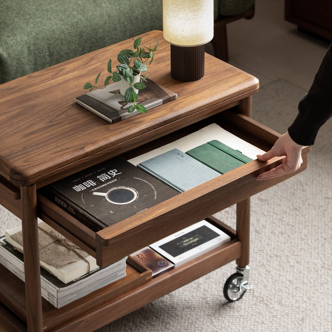 Vintage walnut wood extendable coffee table vorin in real life style.