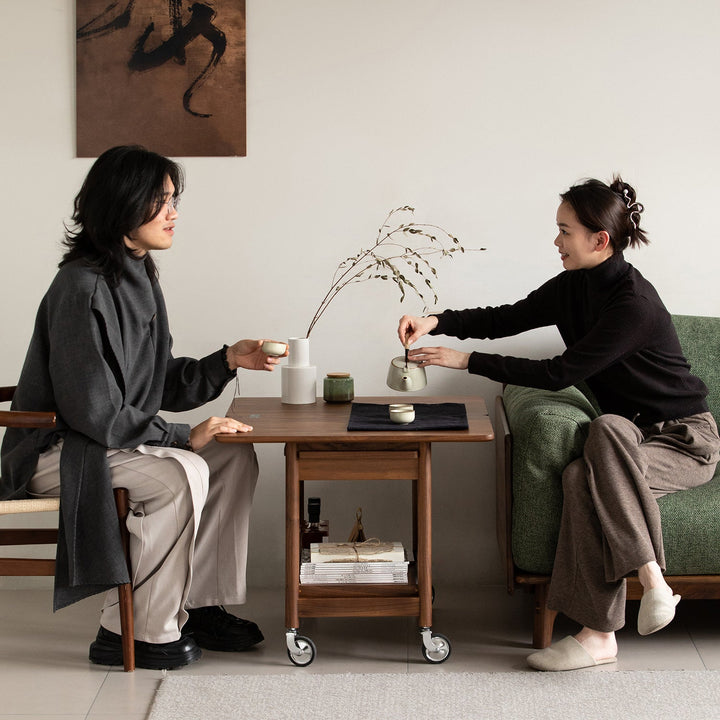 Vintage walnut wood extendable coffee table vorin with context.