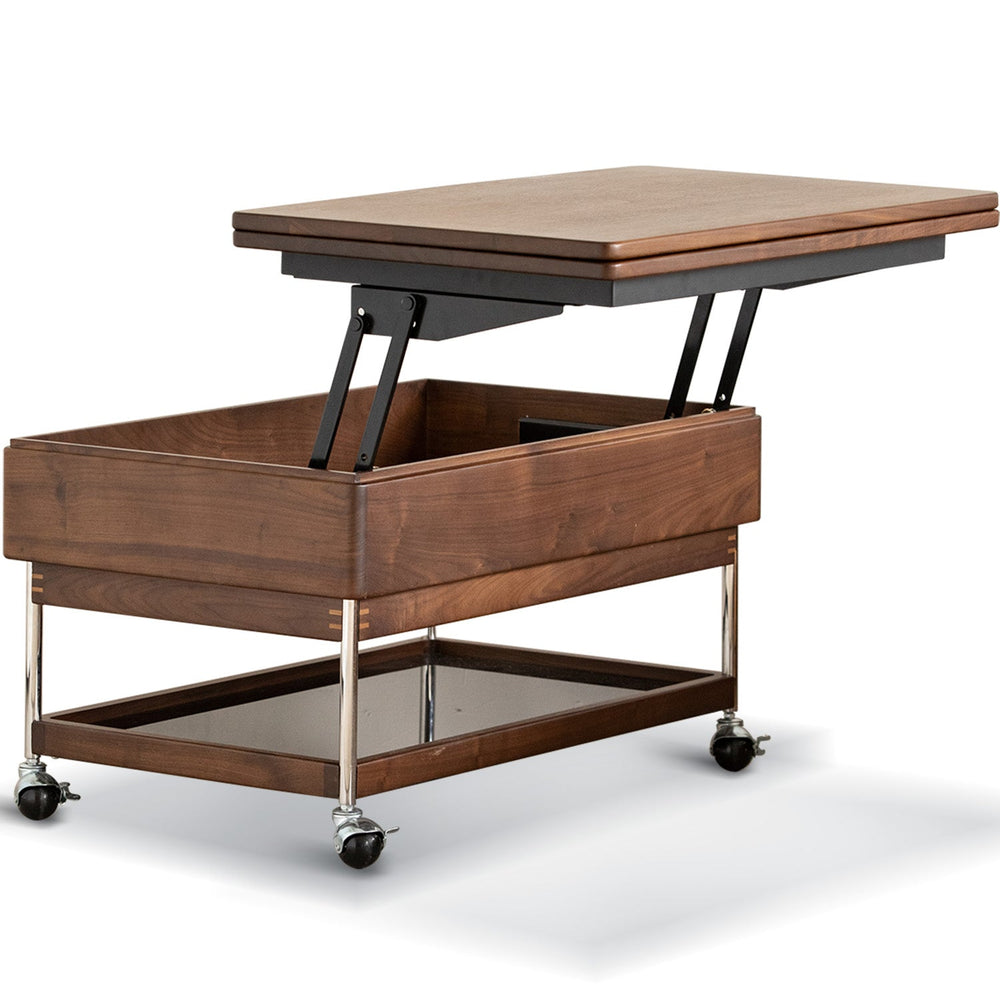 Vintage walnut wood lift-up coffee table seren in white background.