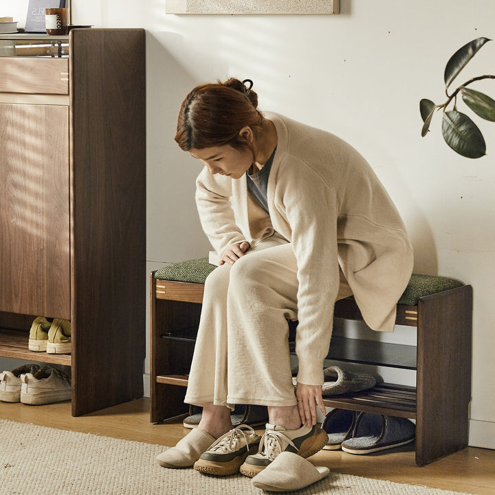 Vintage walnut wood shoe changing bench dawn with context.