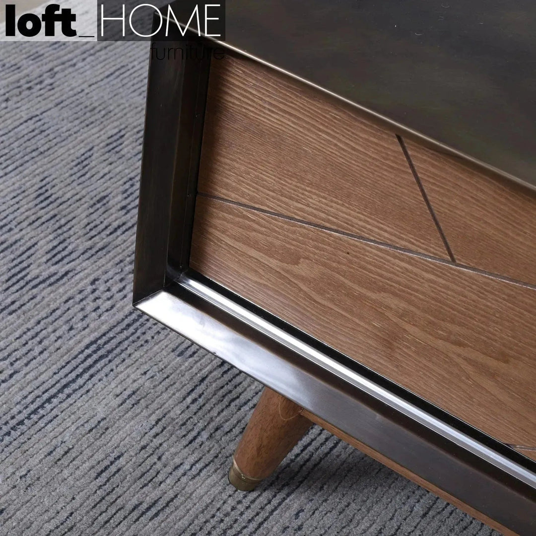 Vintage wooden coffee table vintage brass in details.