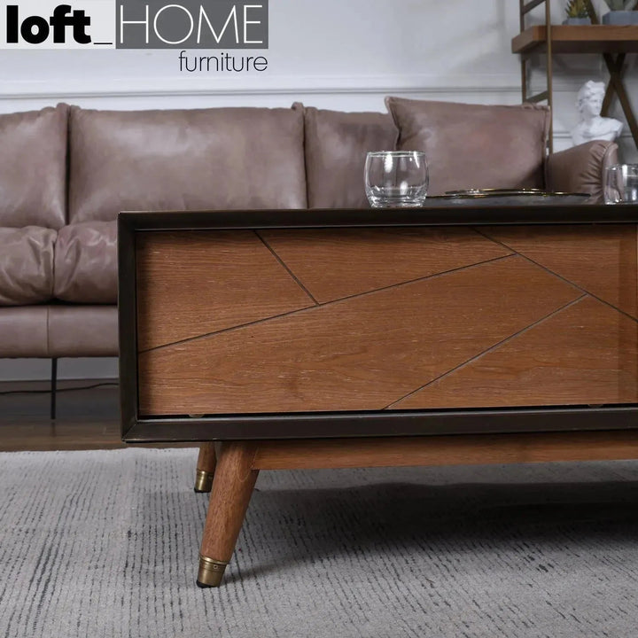 Vintage wooden coffee table vintage brass with context.