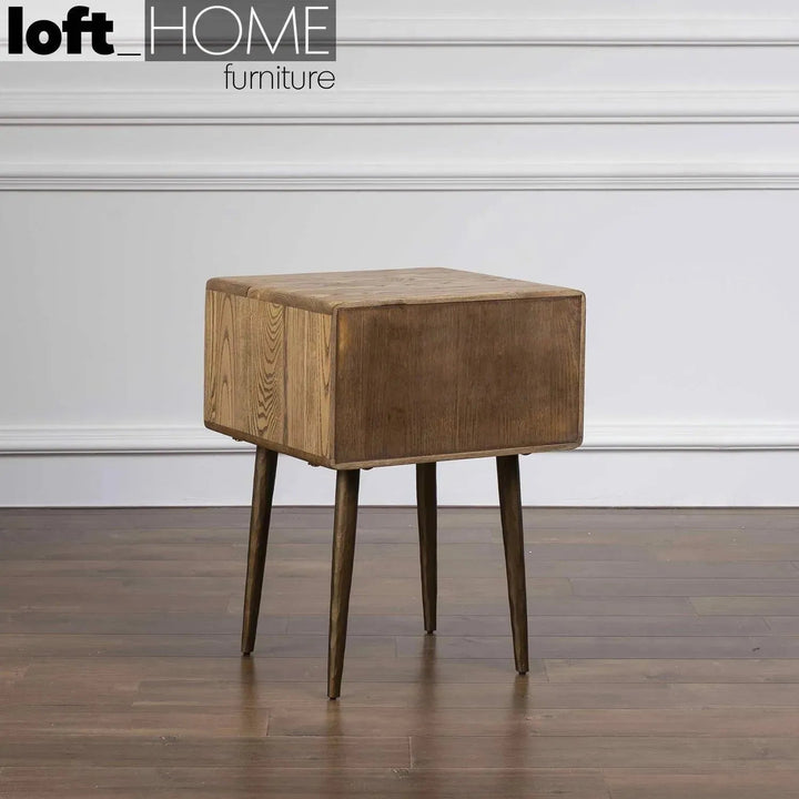 Vintage wooden side table hammer brass in real life style.